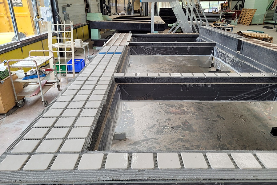 ABN AMRO roof extension with clay tiles on PET bottle facade elements 2