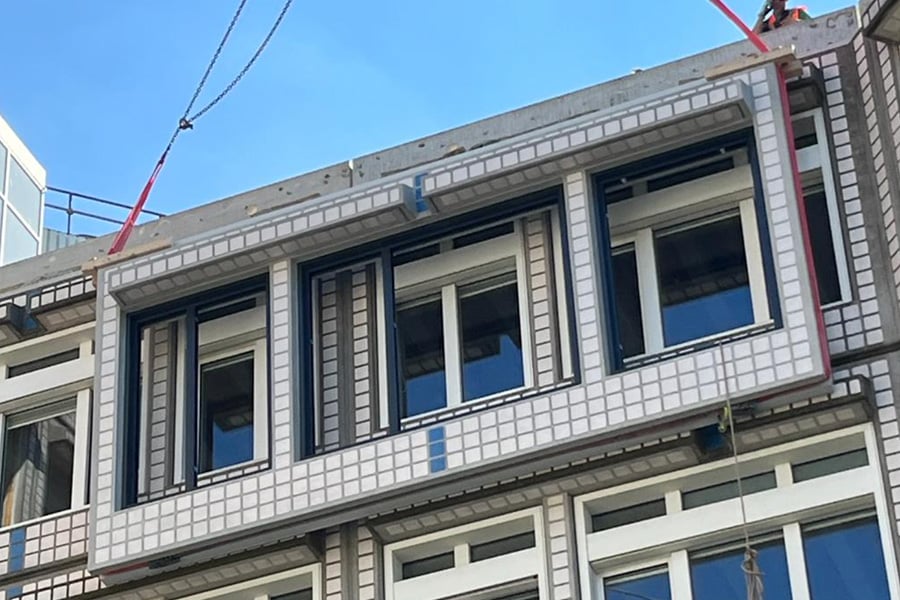 ABN AMRO roof extension with clay tiles on PET bottle facade elements 2